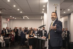 Ryan Delgado accepts award.